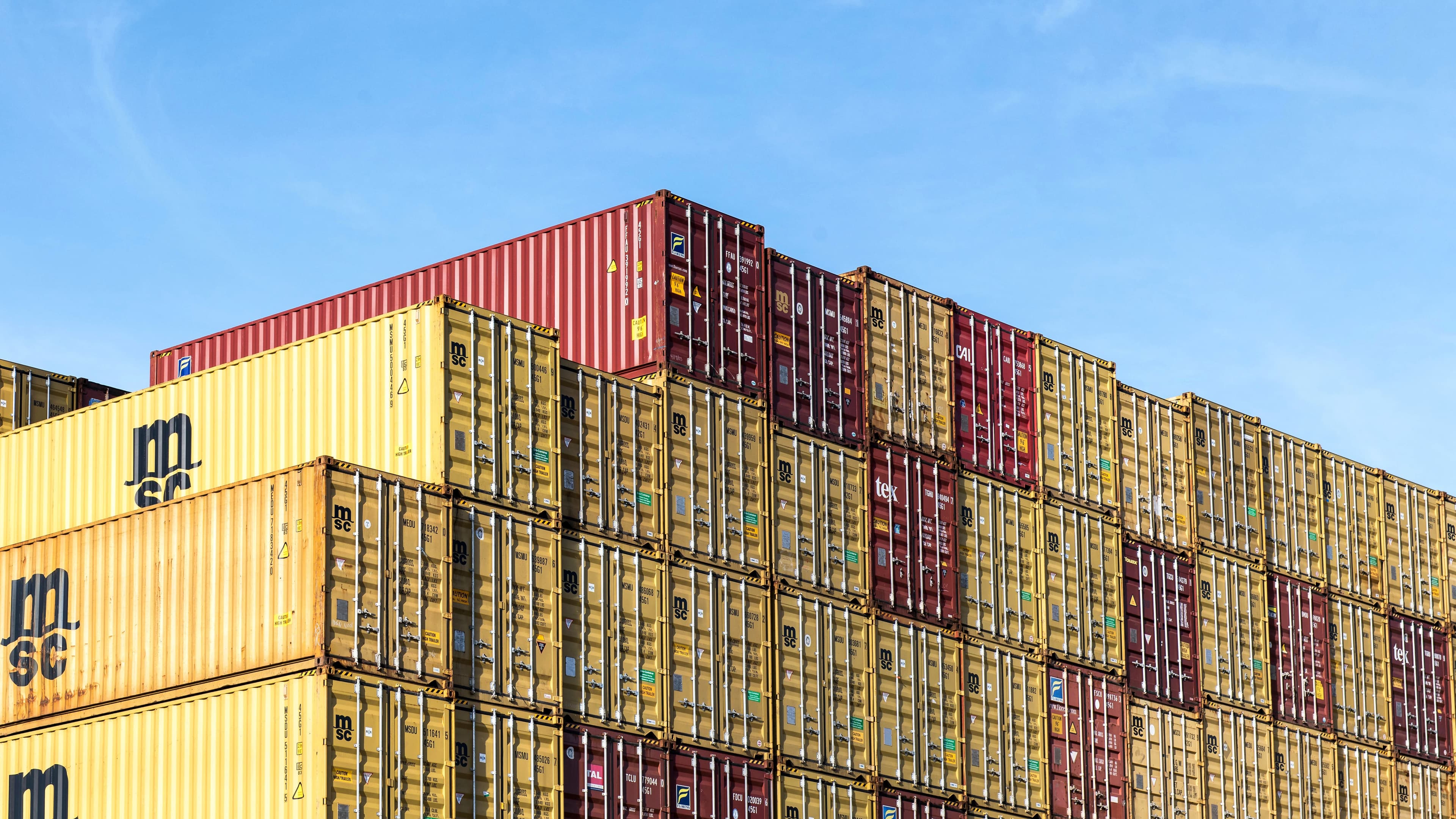 Stacked shipping containers at a freight terminal